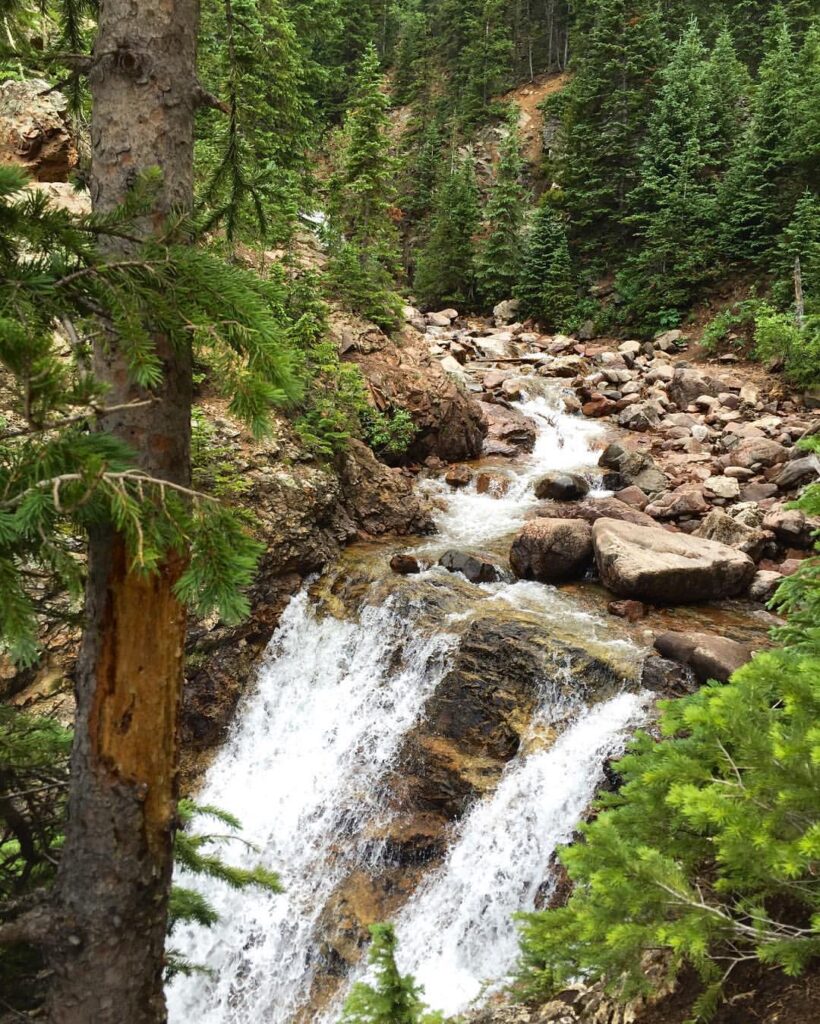 Booth Falls is one of the best places to elope in Vail, Colorado.